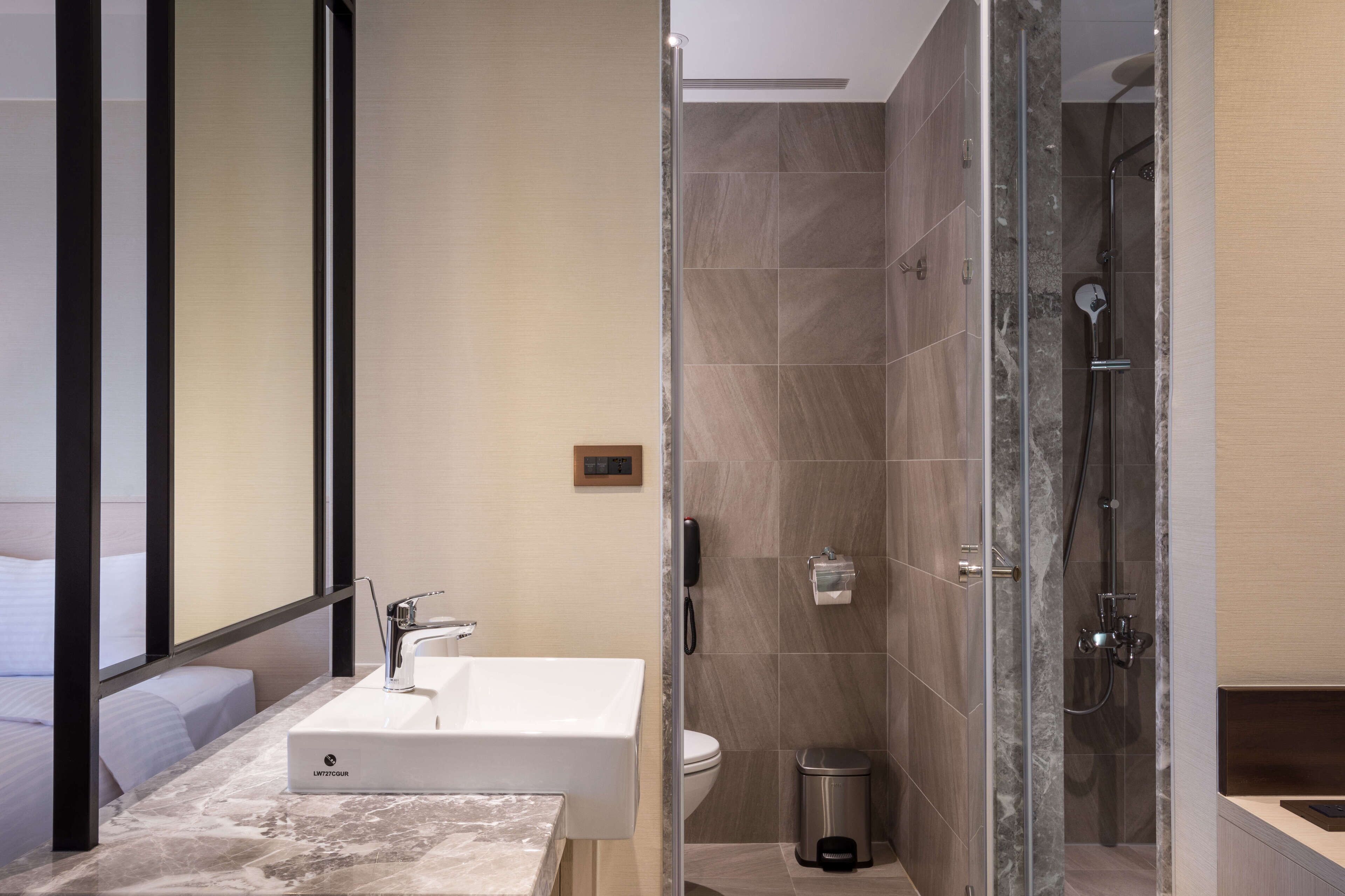 hair dryer, slippers, electronic bidet, towels