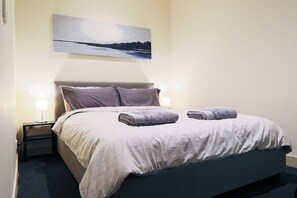 2 bedrooms, premium bedding, memory-foam beds, individually decorated
