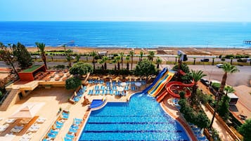 Indoor pool, seasonal outdoor pool, pool umbrellas, pool loungers