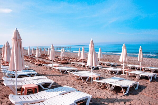 Private beach nearby, sun-loungers, beach umbrellas