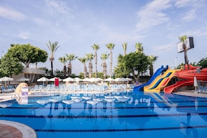Indoor pool, seasonal outdoor pool, pool umbrellas, pool loungers