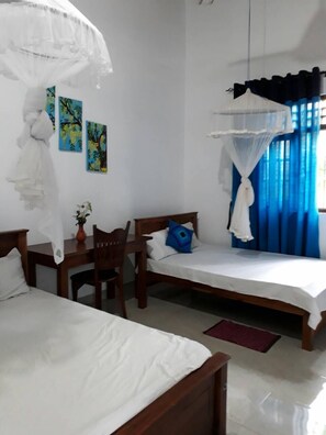 Economy Double Room Single Use, 1 Double Bed, Smoking, Garden View | 1 bedroom, desk, iron/ironing board, free WiFi - Green Villa Homestay (Anuradhapura)