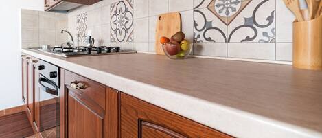 Penthouse clásico, 1 habitación | Cocineta privada