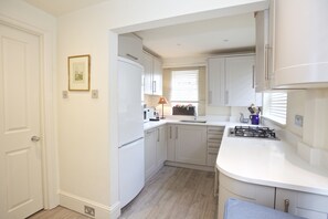 Departamento, 1 habitación | Cocina privada | Refrigerador, microondas, horno y parrilla de estufa