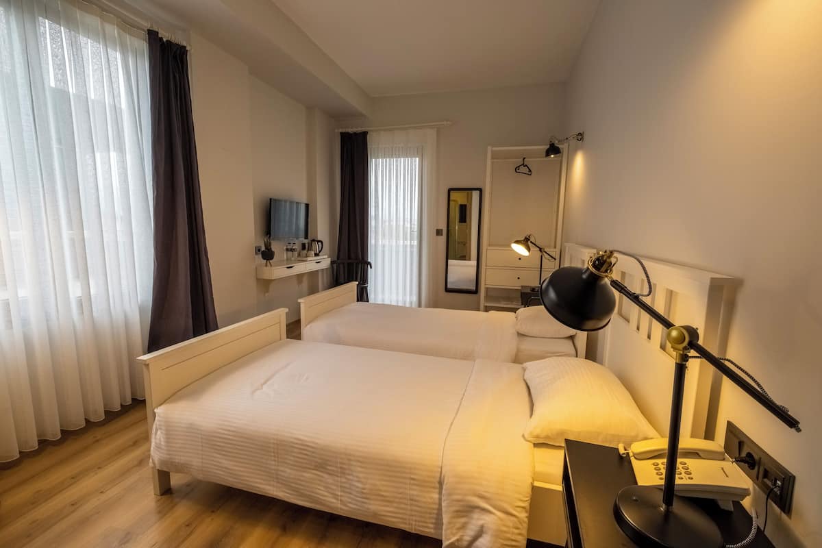 Chambre avec lits jumeaux, vue jardin