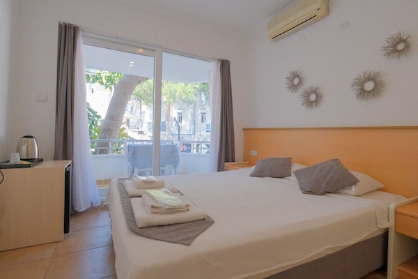 Standard Double Room | Minibar, in-room safe, desk, laptop workspace