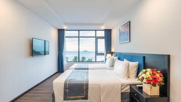 Deluxe Room, Ocean View | 1 bedroom, premium bedding, minibar, in-room safe