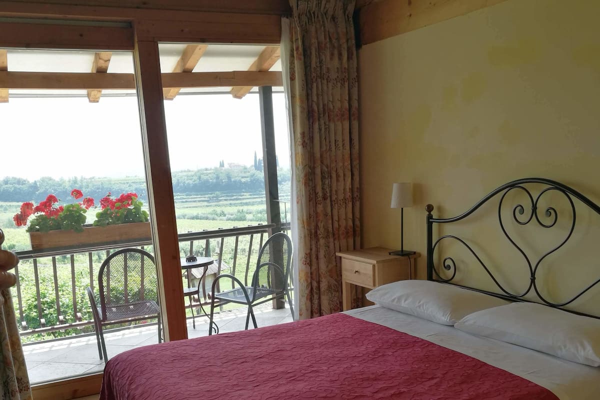 Superior Double Room, Balcony | In-room safe, desk, cots/infant beds, free WiFi