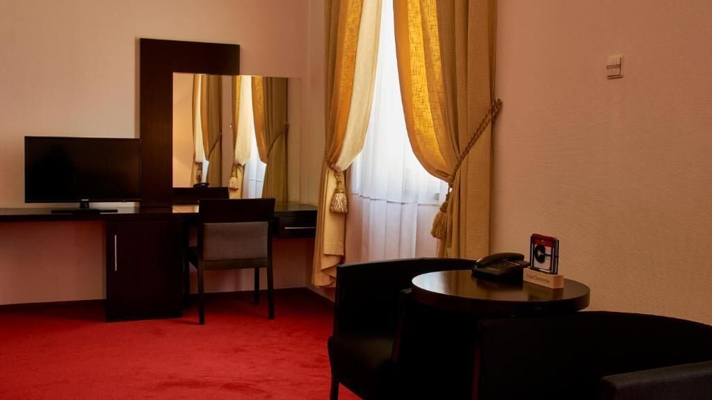 classic double room, 1 bedroom, pool view | 1 bedroom, minibar, in-room safe, desk