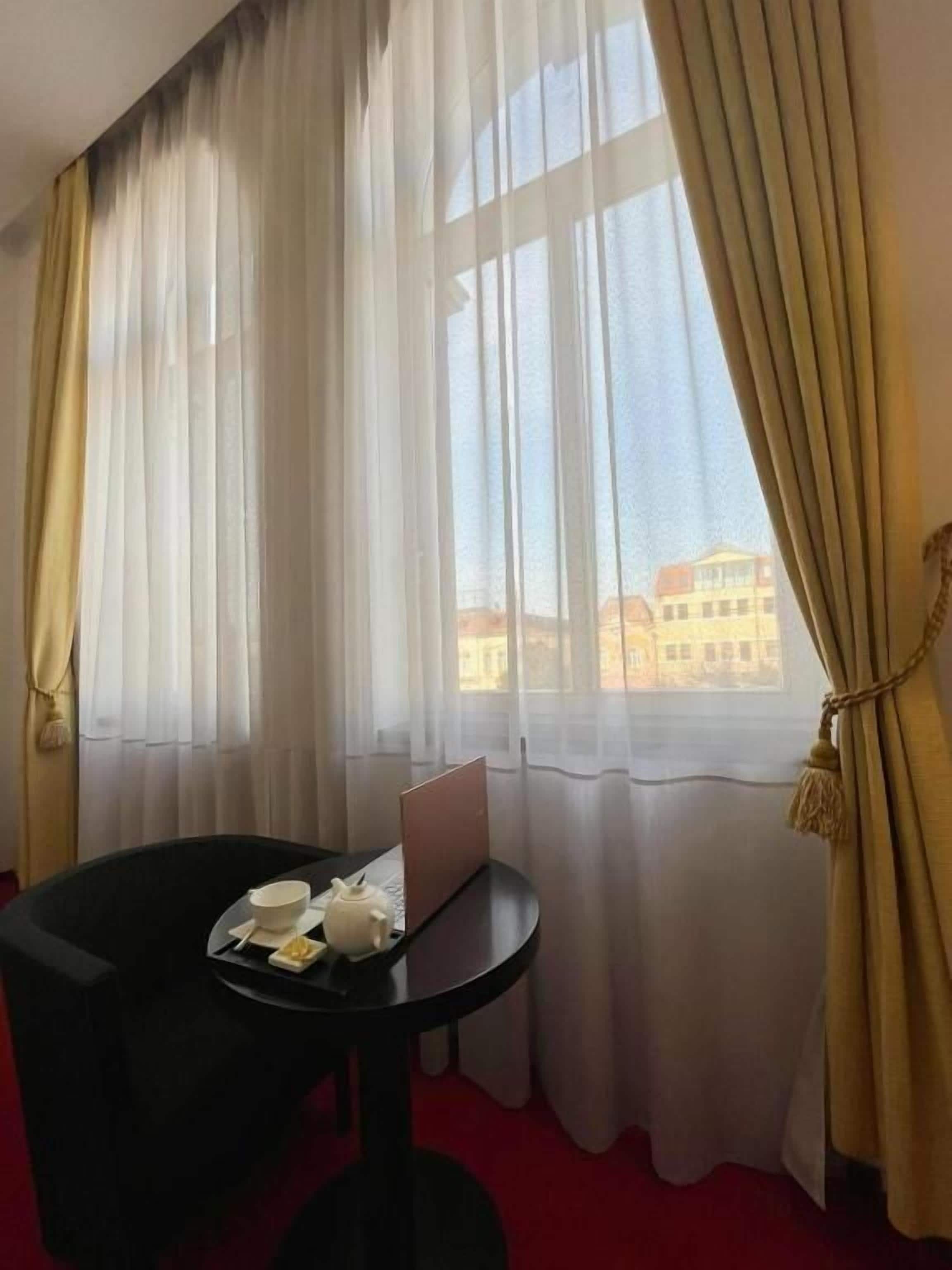 classic double room, 1 king bed, city view | 1 bedroom, minibar, in-room safe, desk