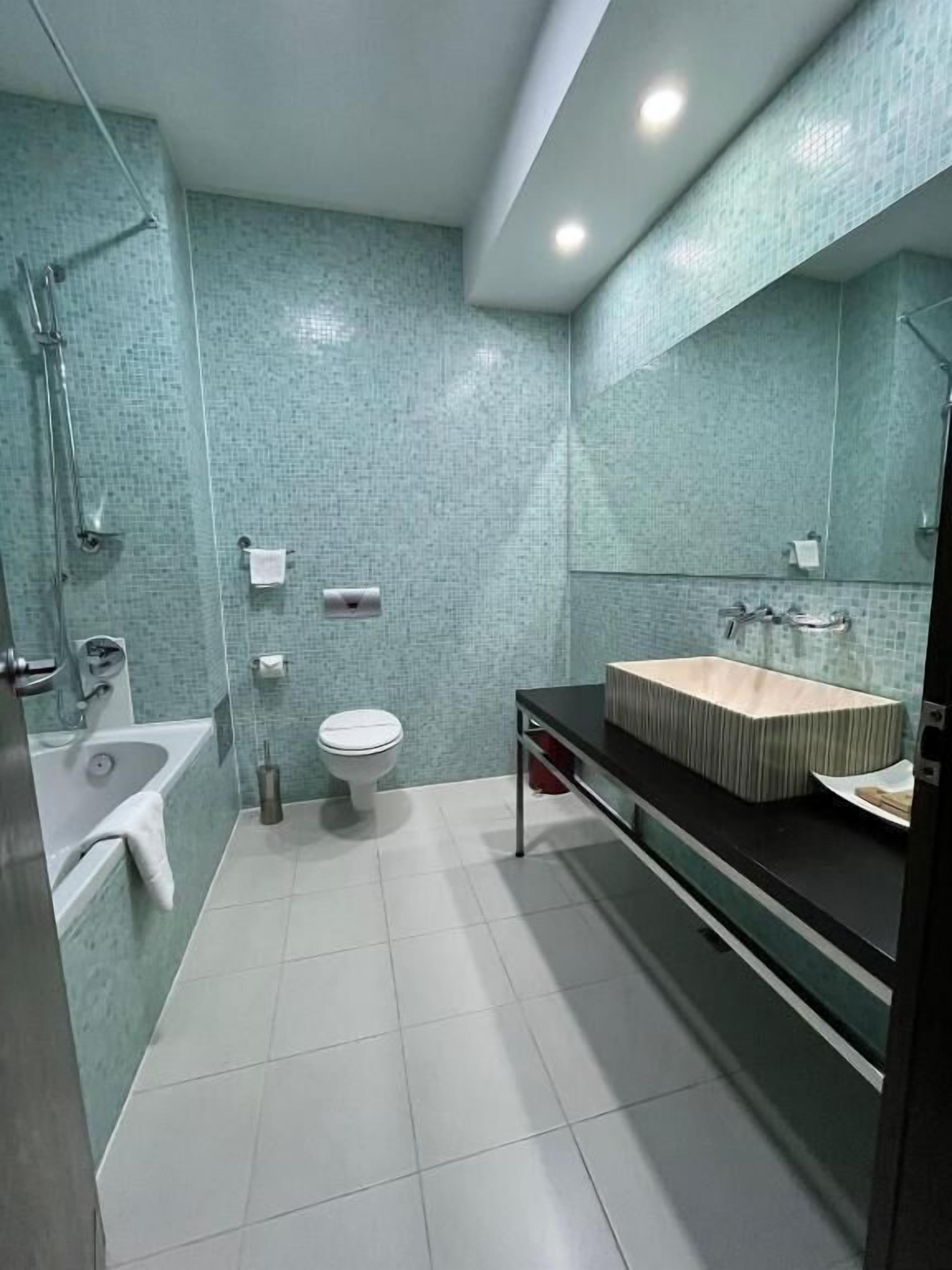 classic double room, 1 bedroom, pool view | bathroom | hair dryer, bathrobes, slippers, towels