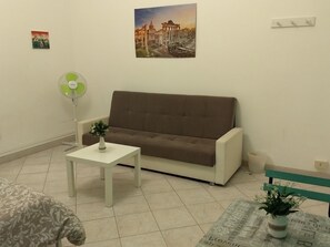 Economy Quadruple Room, Shared Bathroom | Down comforters, desk, iron/ironing board, free rollaway beds - amoRaRoma (Rome)