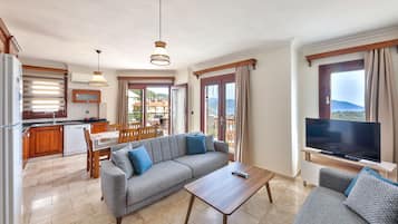 Apartment, 2 Bedrooms | Living area | LCD TV