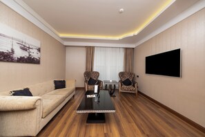 Suíte presidencial | Área de estar | Smart TV 55 polegadas com canais via satélite