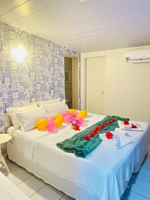 Standard Triple Room | Minibar, bed sheets - Pousada Sao Silmares (Fernando de Noronha)