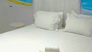 Quarto triplo standard | Frigobar, roupa de cama