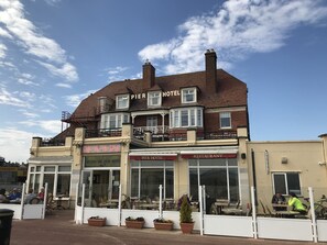 Enjoy a classic seaside dining experience with a view of the street from our restaurant.