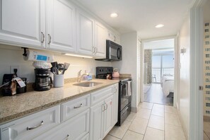 Condo, 1 Bedroom, Balcony, Oceanfront (1610) | Private kitchen | Full-size fridge, microwave, oven, stovetop - Camelot by the Sea by Elliott Beach Rentals (Myrtle Beach)