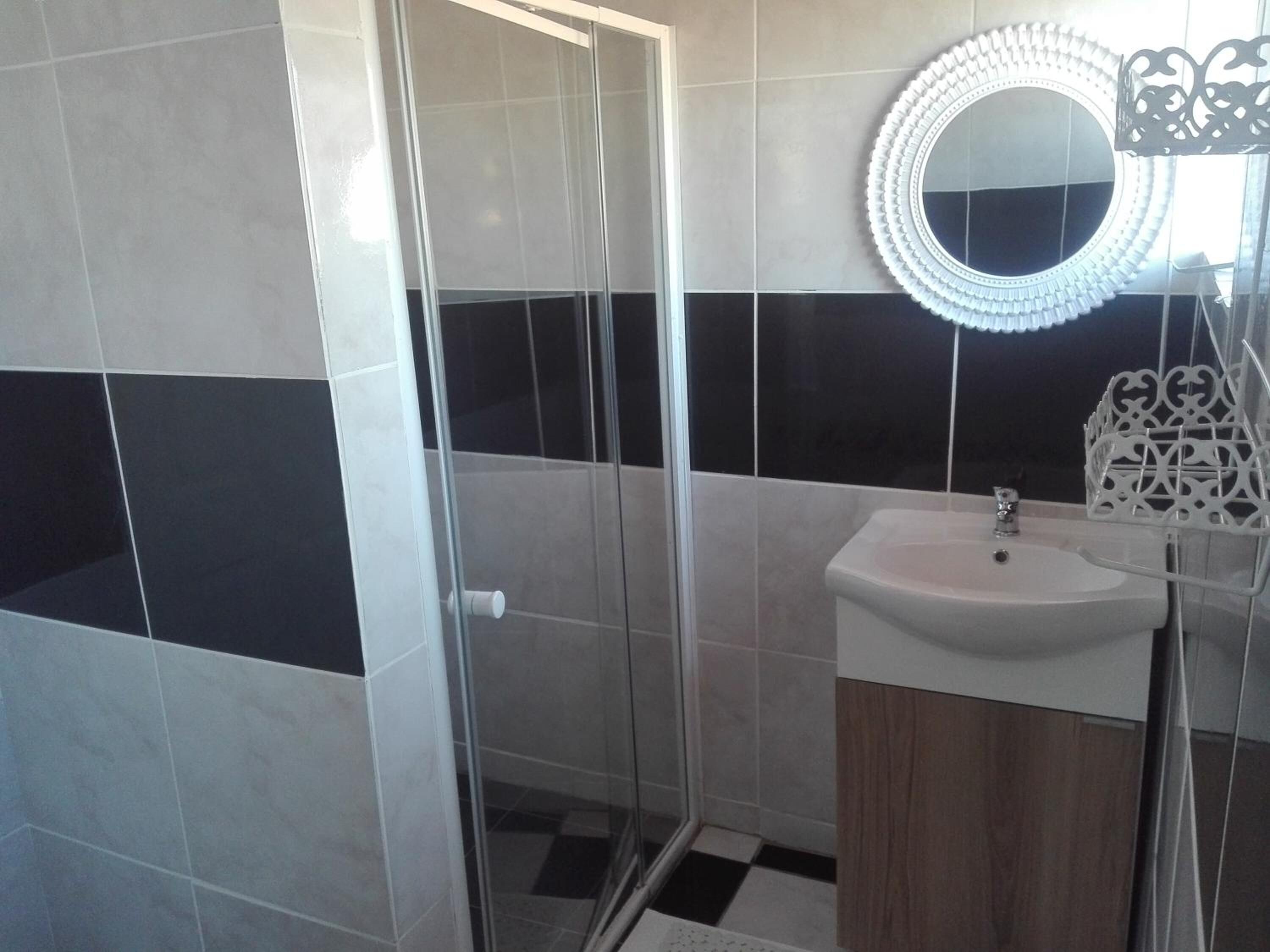 Shower, deep soaking tub, free toiletries, hair dryer