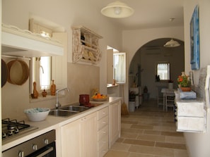 Fridge, stovetop, cookware/dishes/utensils