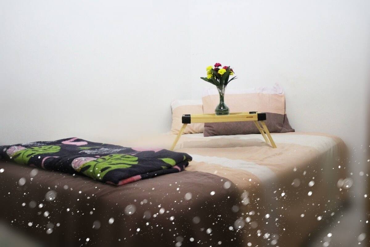 Blackout curtains, iron/ironing board, free WiFi, bed sheets