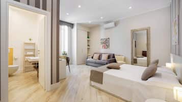 Chambre Quadruple Familiale, 1 grand lit et 1 canapé-lit, dans la tour | 1 chambre, draps italiens Frette, literie de qualité supérieure