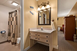 Standard Room, 2 Queen Beds | Bathroom | Hair dryer, towels, shampoo