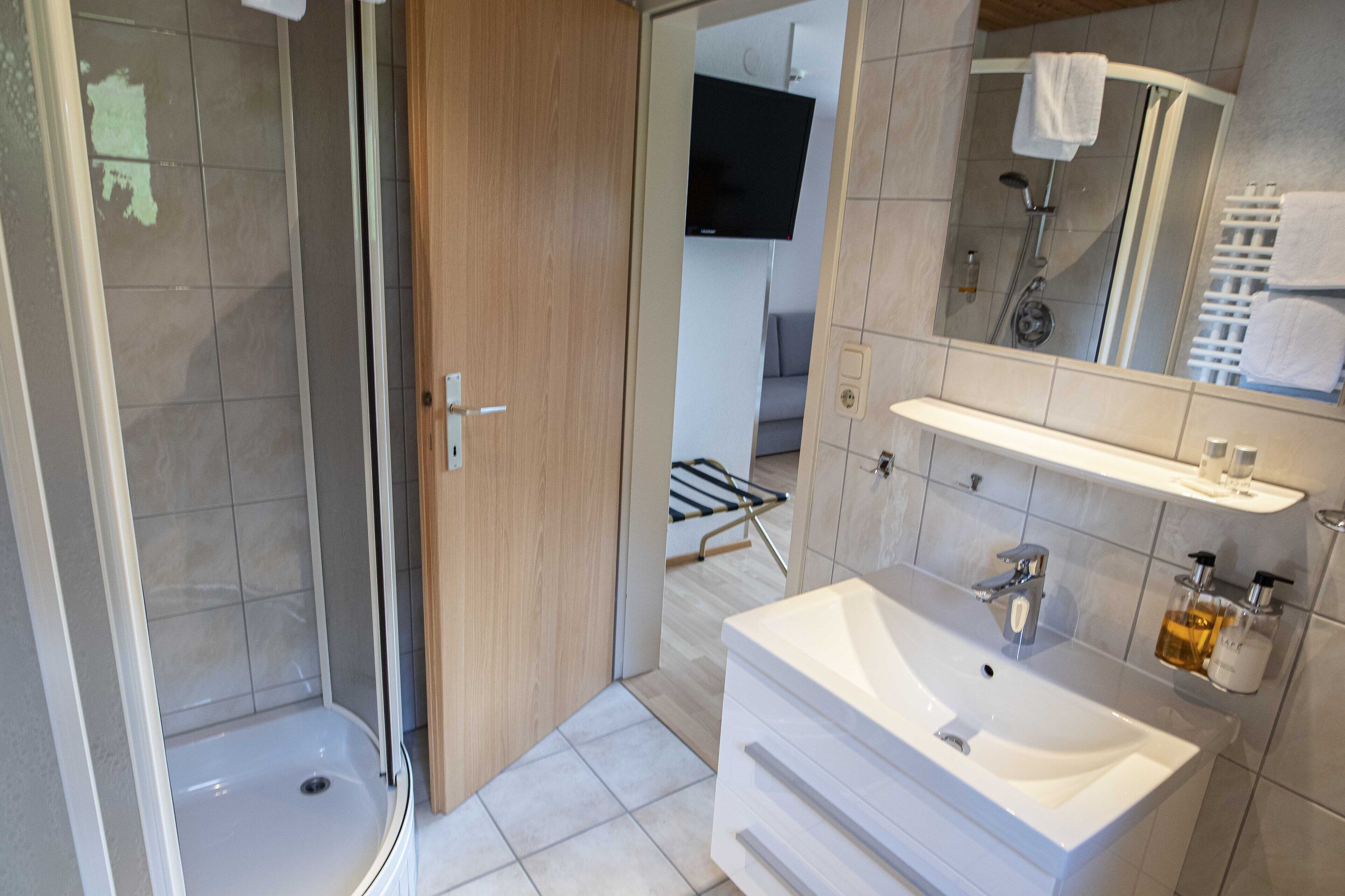 traditional double room | bathroom | free toiletries, hair dryer, bathrobes, towels