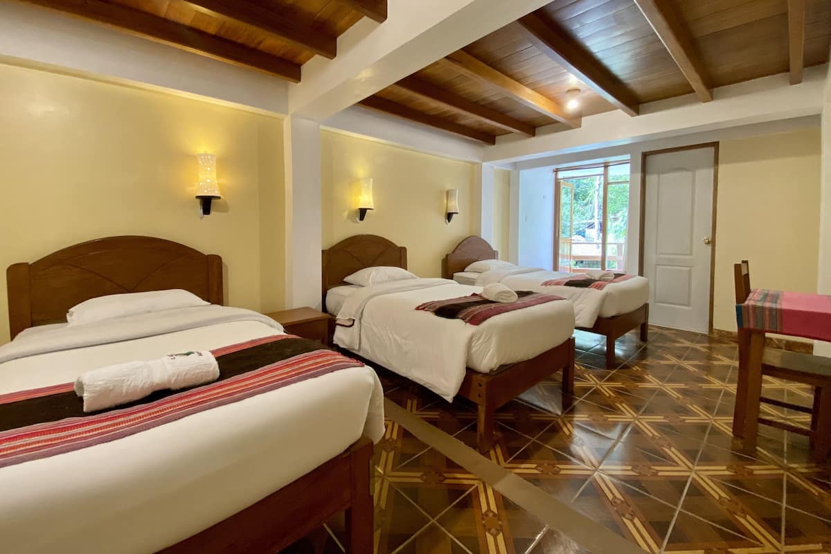 Triple Room, Private Bathroom, River View | Desk, laptop workspace, free WiFi, bed sheets