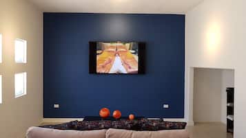 Casa | Área de sala de estar | Televisión de pantalla plana