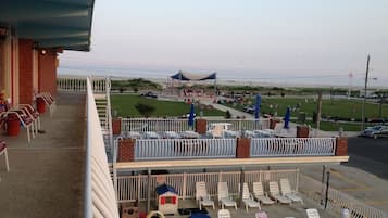 Outdoor pool, open 10:00 AM to 7:00 PM, pool loungers