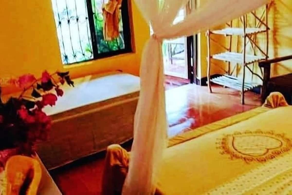 Kahden hengen deluxe-huone, näköala puutarhaan | 1 makuuhuone, ylelliset vuodevaatteet, tallelokero huoneessa