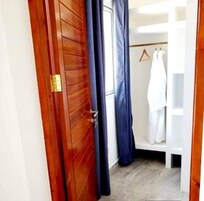 Deluxe Quadruple Room, 1 Bedroom | 1 bedroom, premium bedding, in-room safe, individually decorated