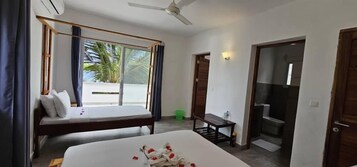 Habitación Deluxe doble, vistas al jardín | 1 dormitorio, ropa de cama de alta calidad, caja fuerte