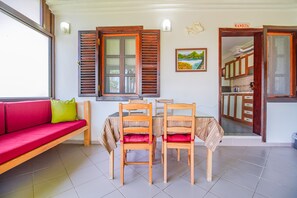 Apartment, 2 Bedrooms | Living area | 32-inch LED TV with satellite channels - Mine Apart (Bozcaada)