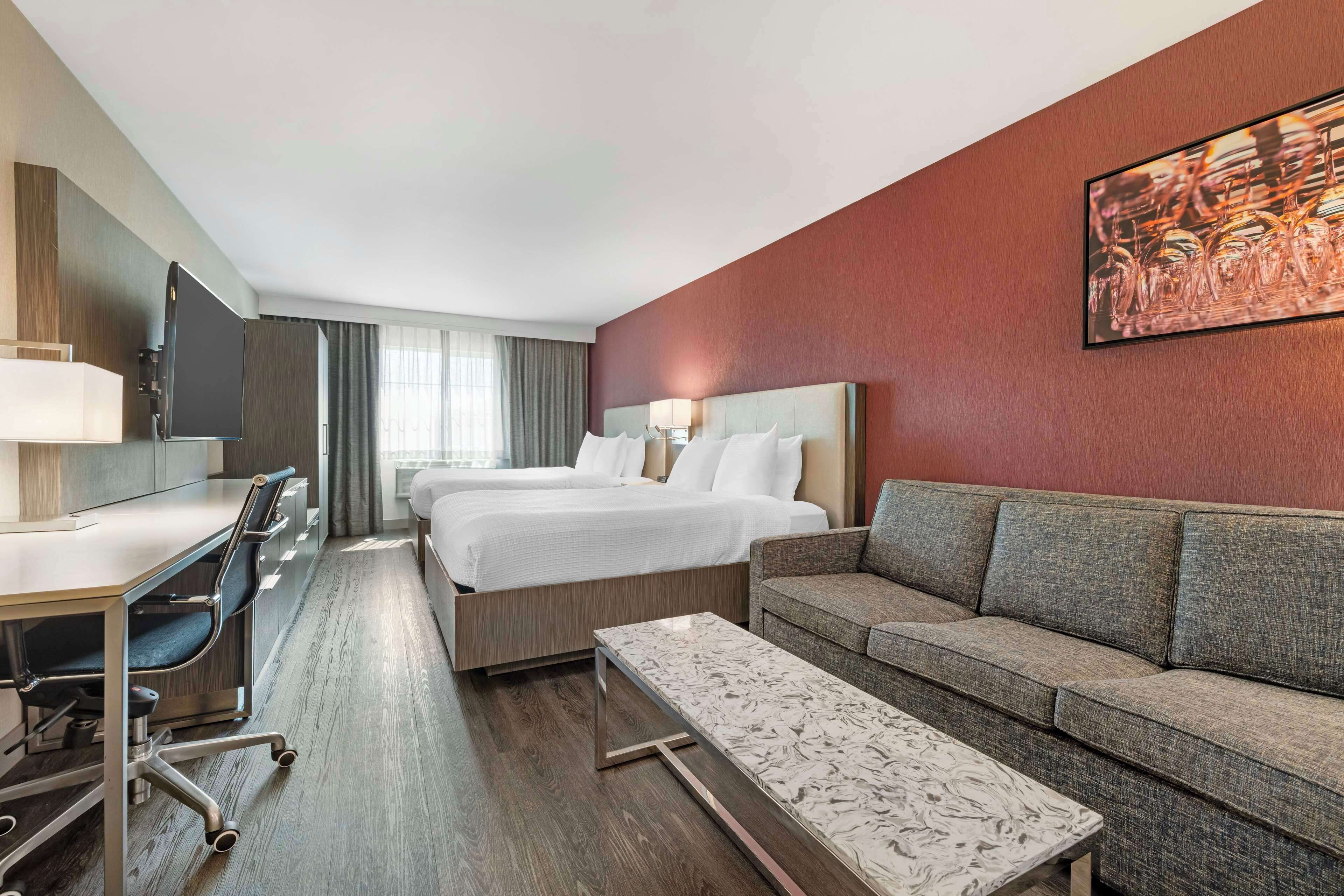 suite, 2 queen beds, accessible, non smoking (walk-in shower;with sofabed) | pillow-top beds, in-room safe, desk, laptop workspace