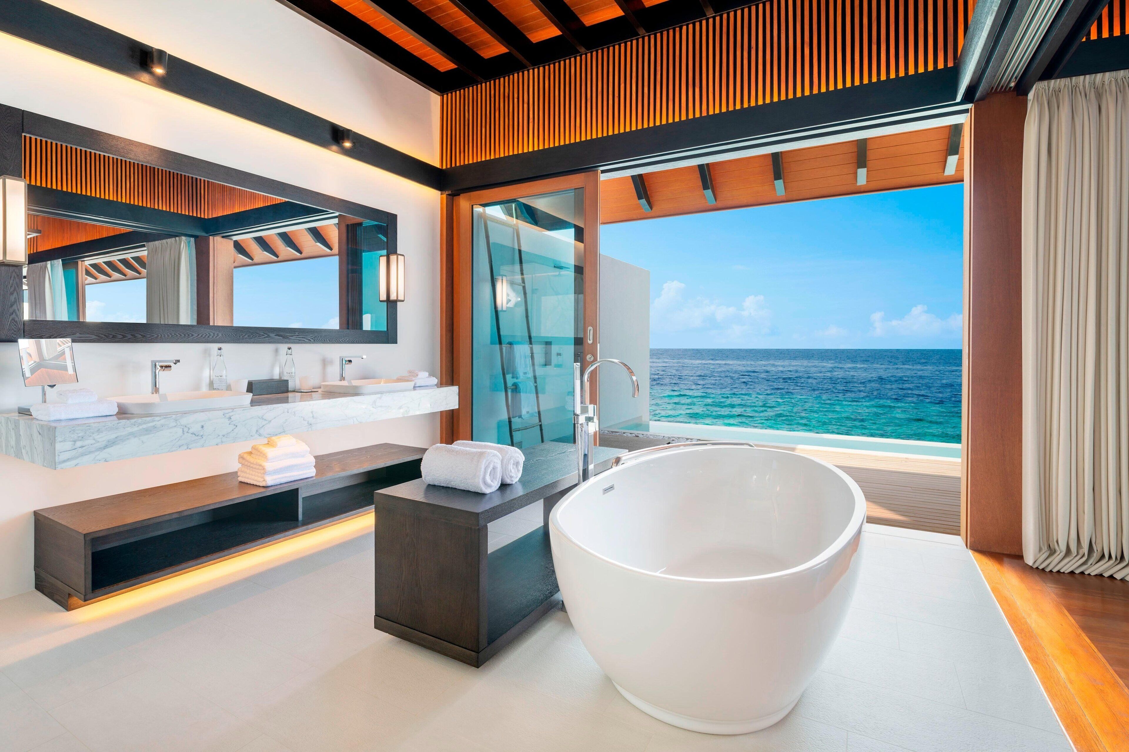 separate bathtub and shower, deep-soaking bathtub, rainfall showerhead