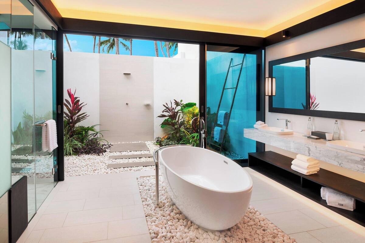 separate bathtub and shower, deep-soaking bathtub, rainfall showerhead