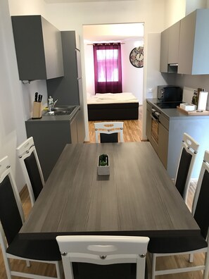 Deluxe Apartment, 2 Bedrooms, Balcony (Arsenal TOP 6 incl. Extra Fees) | Private kitchen | Full-size fridge, microwave, oven, stovetop