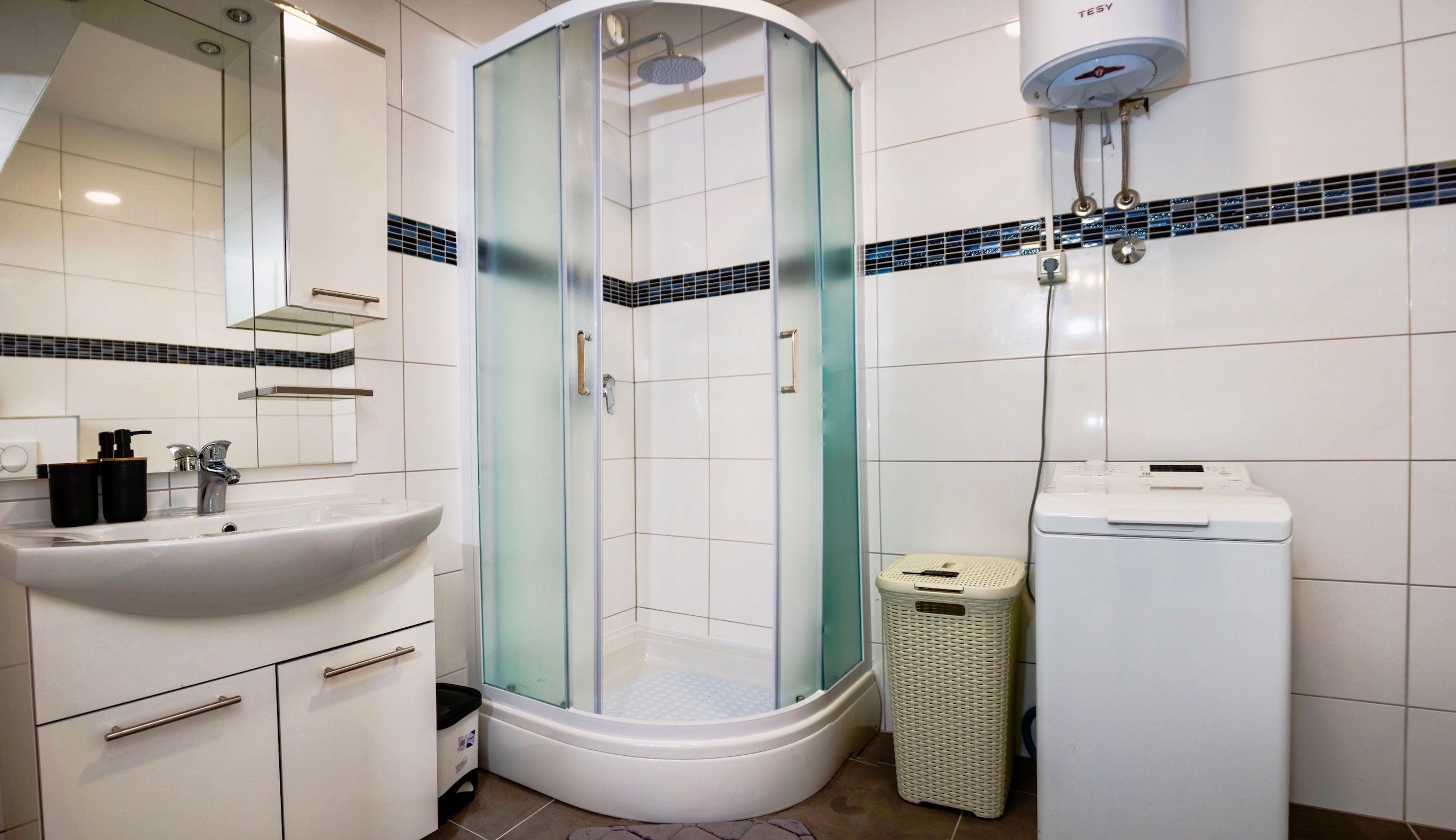luxury apartment, 2 bedrooms, courtyard area | bathroom | shower, rainfall showerhead, free toiletries, hair dryer