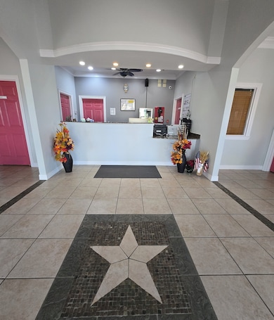 Check-in/check-out kiosk. Whitesboro Inn & Suites