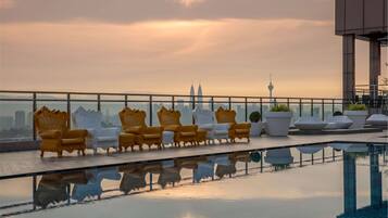 Outdoor pool, open 7:00 AM to 10:00 PM, sun loungers