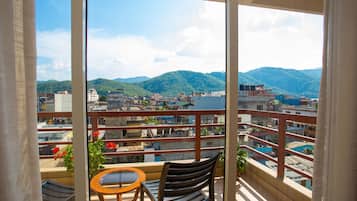 Suite junior | Zona de estar | Una televisión de pantalla plana