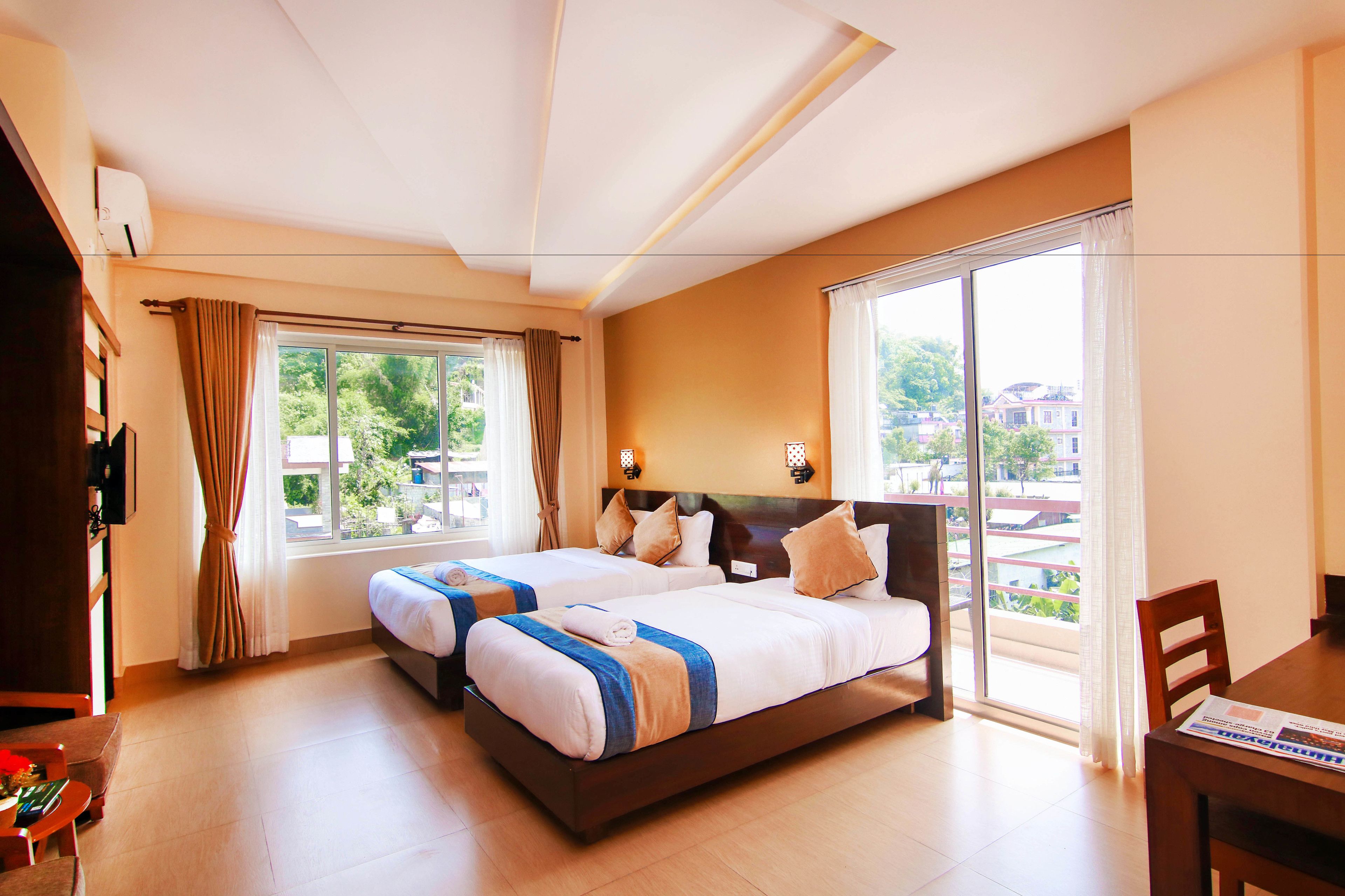 family room | premium bedding, minibar, in-room safe, desk