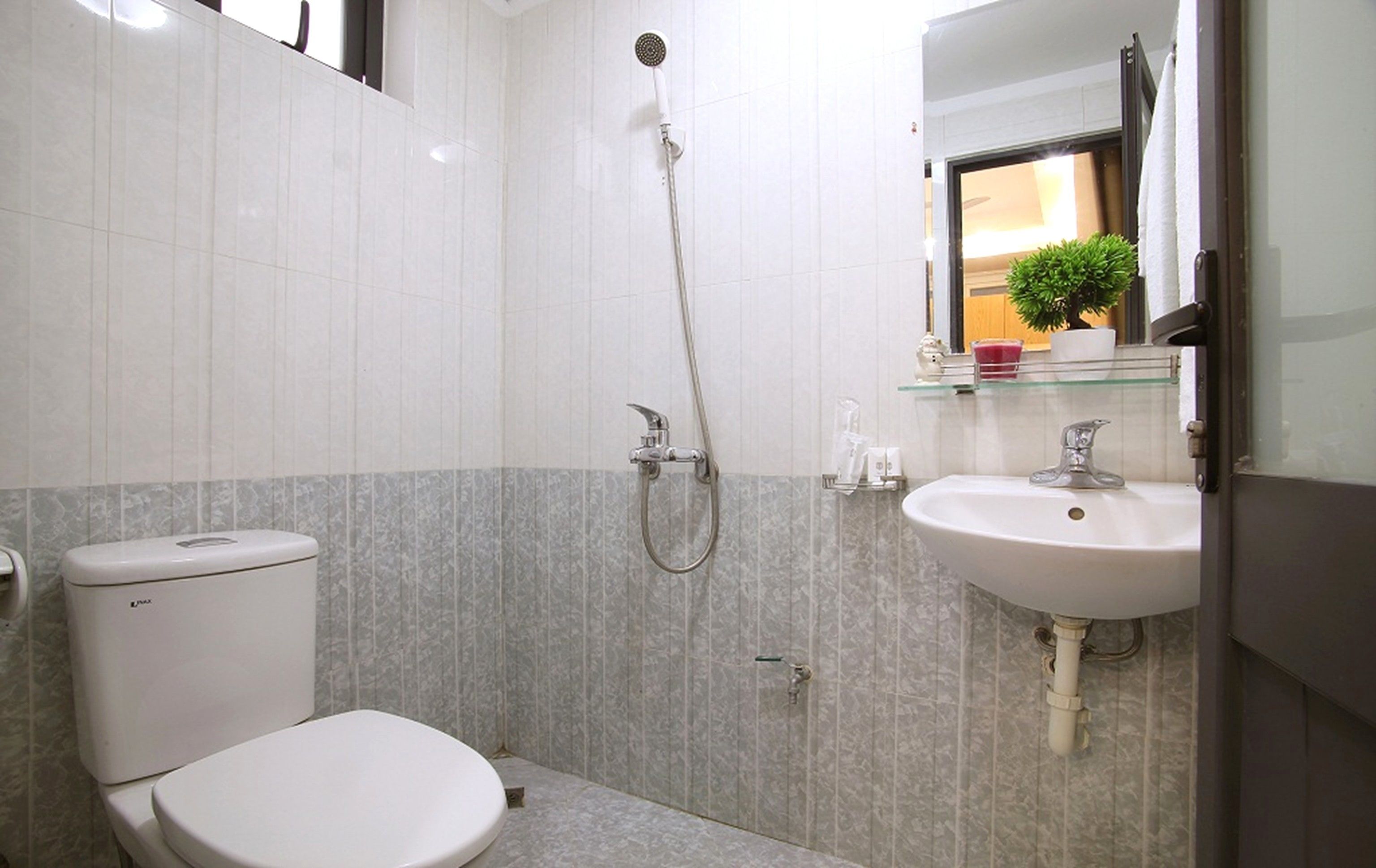 Shower, free toiletries, hair dryer, slippers