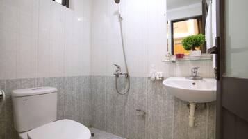 Shower, free toiletries, hair dryer, slippers