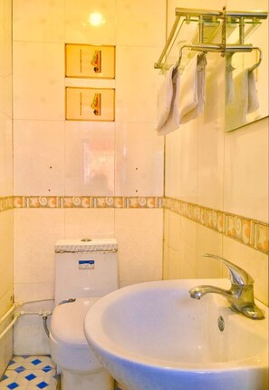 Shower, free toiletries, hair dryer, slippers