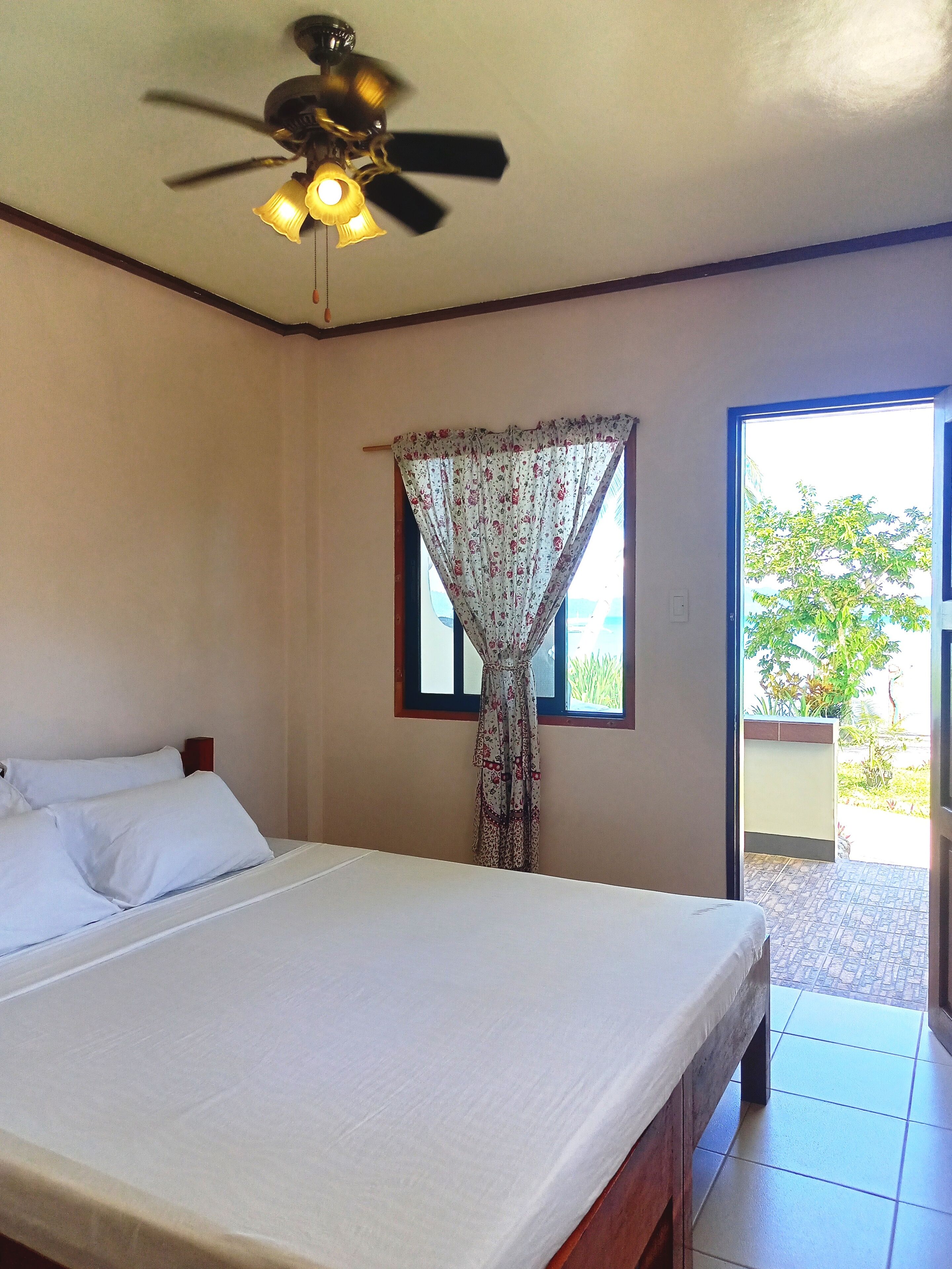 double aircon room with sea view | 1 bedroom, soundproofing, bed sheets