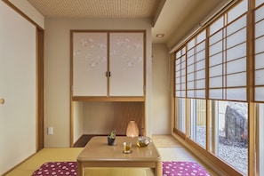 Japanese-style Apartment, 3 Bedrooms, Kitchen, Garden View | Down comforters, blackout drapes, iron/ironing board, free WiFi