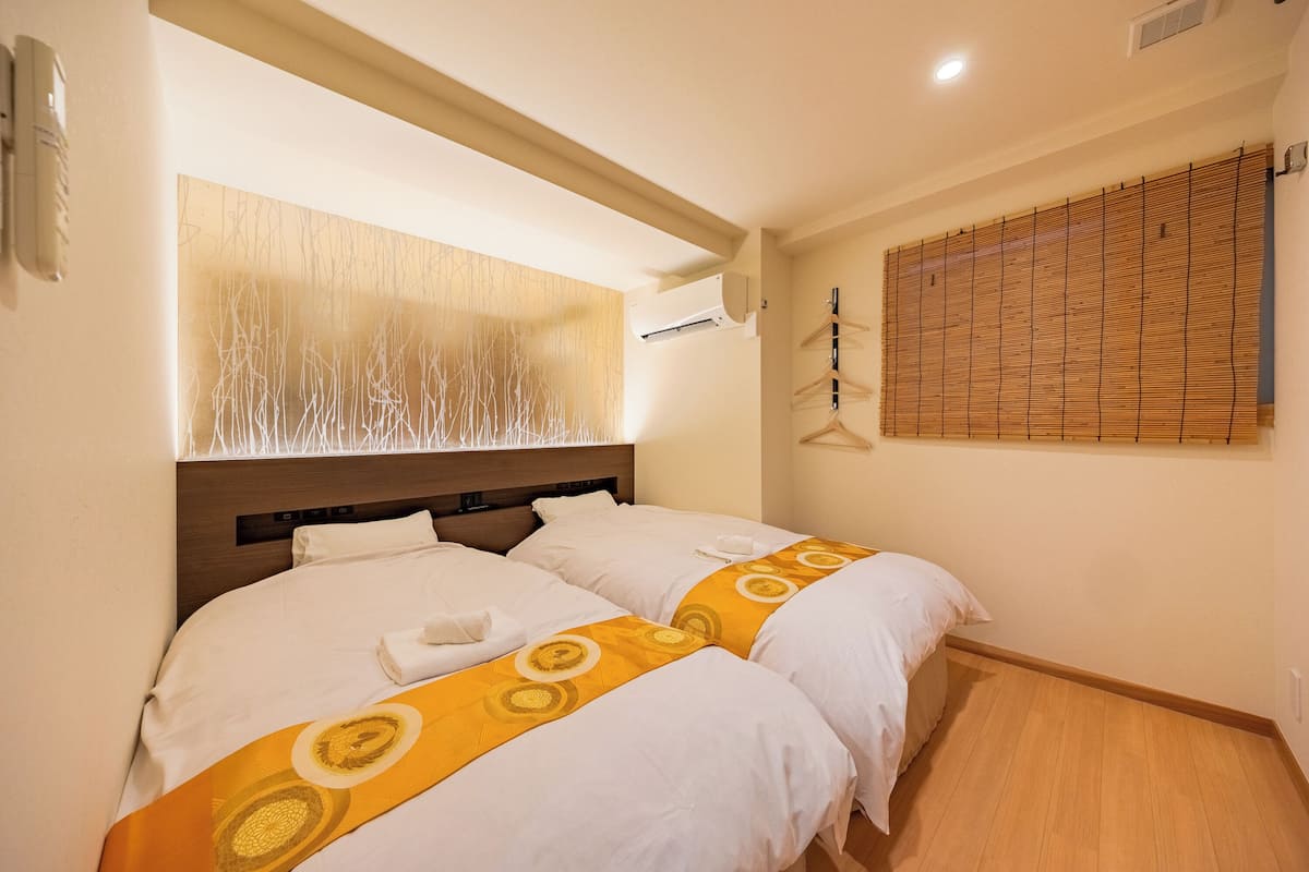 3 bedrooms, down duvets, blackout curtains, iron/ironing board